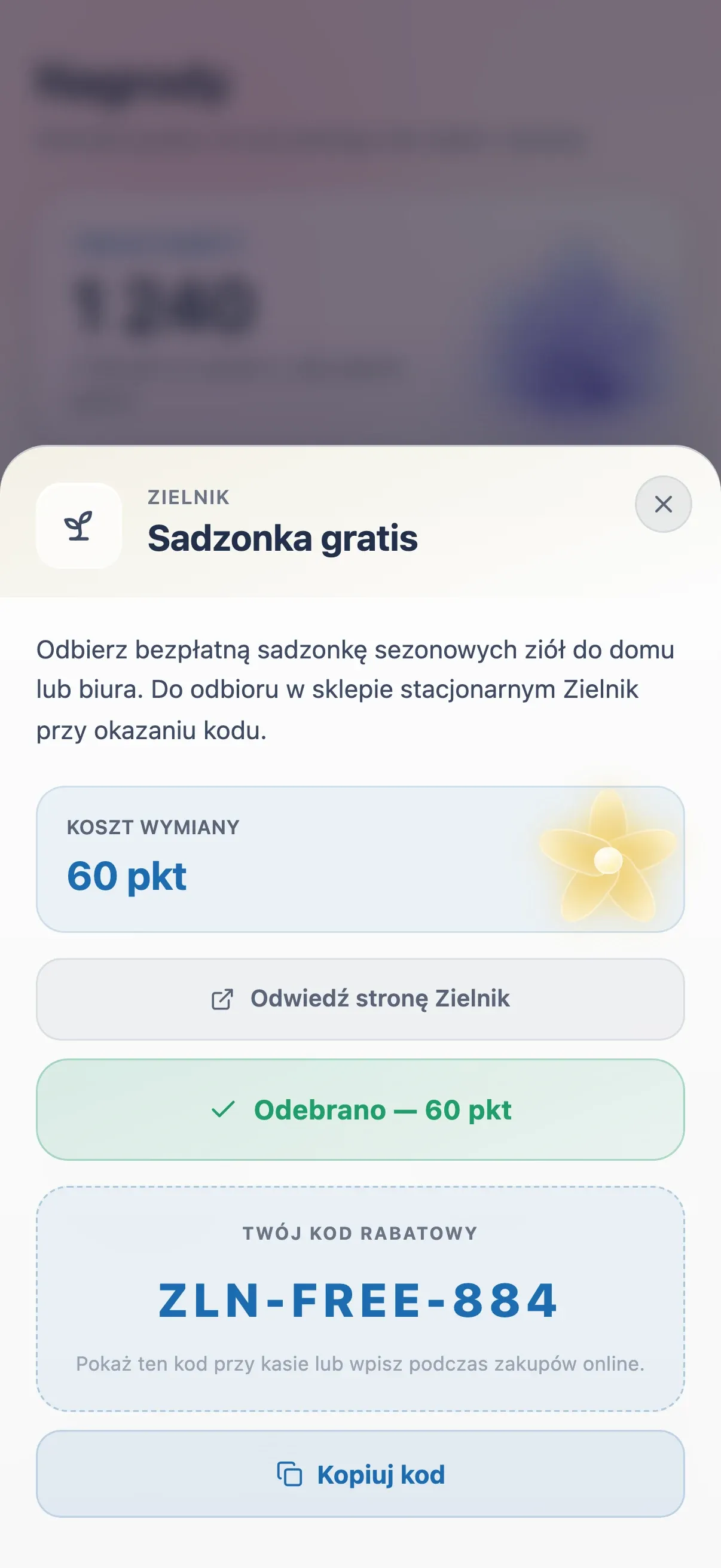 The rewards sheet after claiming a free seedling: the 60-point cost, a confirmation and a discount code with a copy button